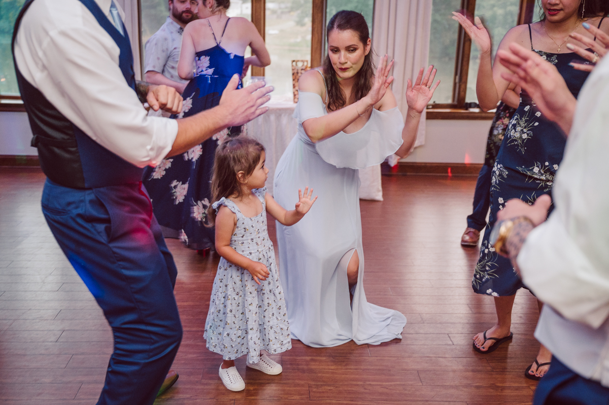 These two dancers, passionate lovers got married on a hot humid day at Auletto Caterers in Deptford NJ. Even though it was hot & humid Nina and Hector were all smiles as well as their family during the family portrait time. Wedding couple's and families that listens to you and does everything you ask them to even though the weather and environment can be tough are the BEST kind of clients! Nina and Hector were that best ideal clients, they from day one left all control regarding photo to me, did not question or have concerns. Knowing that you have this full trust and control on the wedding day makes you want to give your 100% and more. Nina and Hector are one of my top ideal clients and their wedding day photos are living proof of it. Nina and Hector's wedding day was combined of casual, mess, chaos, laughters, chill, emotional and passionate love for dancing. This was my first time at Auletto Caterers and in this part of NJ and this wedding venue in Deptford NJ was a pleasant surprise. It was full of secret locations for photos, garden, little pond where I played around with reflections, peacocks, waterfall and lavender field! Plus kind people to work with. Nina and Hector's July wedding at Auletto Caterers NJ captured by Karis from Hey Karis NY, NJ, Brooklyn, Hudson Valley and Catskills Wedding and Elopement Photographer.